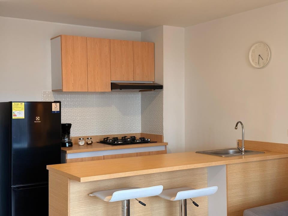 Kitchen or kitchenette, stove
