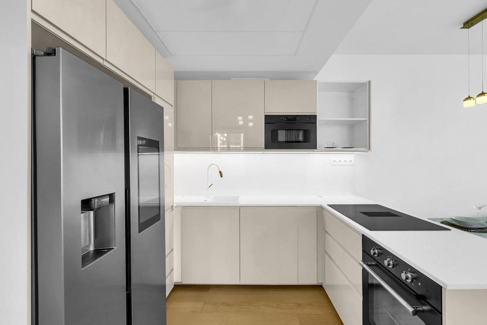 Kitchen or kitchenette, dishwasher, oven, stove