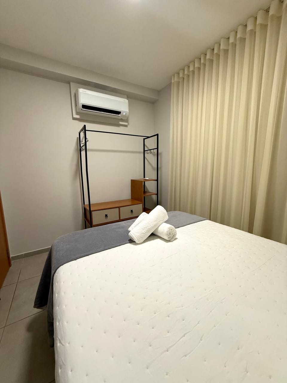 Bed, Photo of the whole room, Bedroom, towels, air conditioner