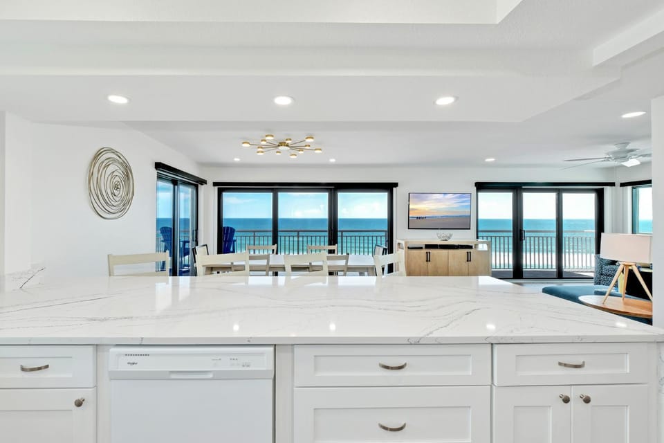 Direct oceanfront corner penthouse with huge wrap-around balcony offering beach and pool views House in Florida
