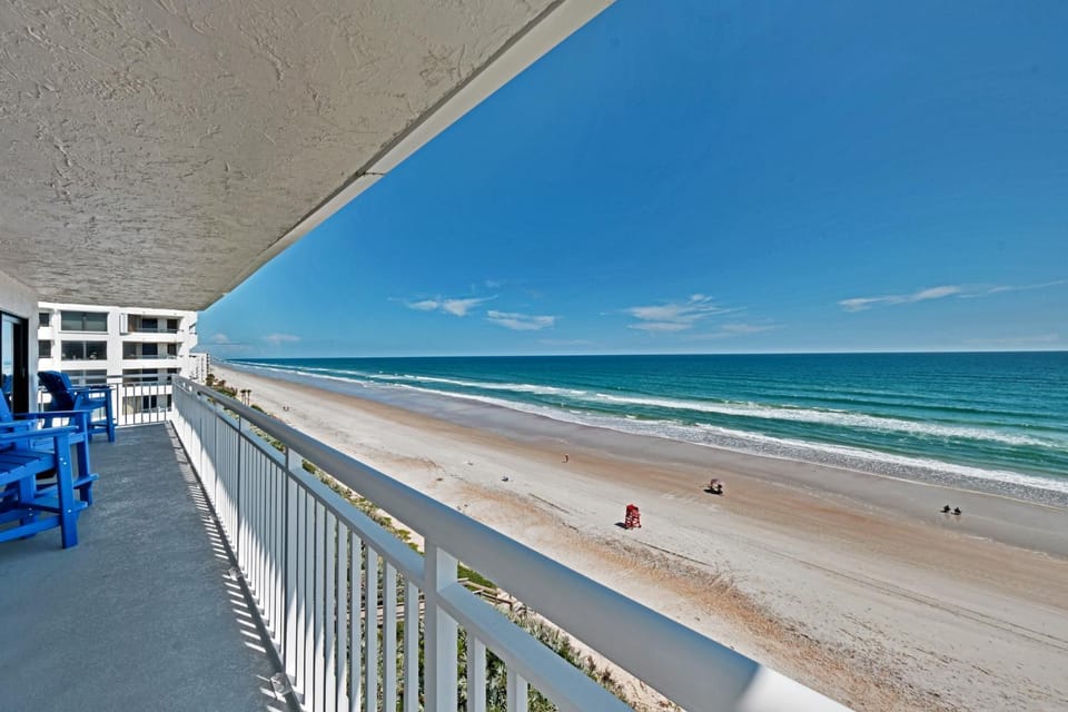 Direct oceanfront corner penthouse with huge wrap-around balcony offering beach and pool views House in Florida
