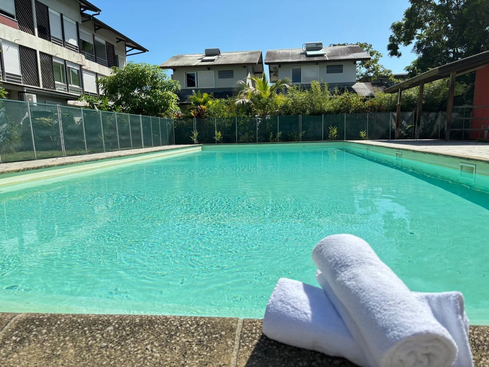 Property building, Day, Pool view, Swimming pool, sunbed, towels