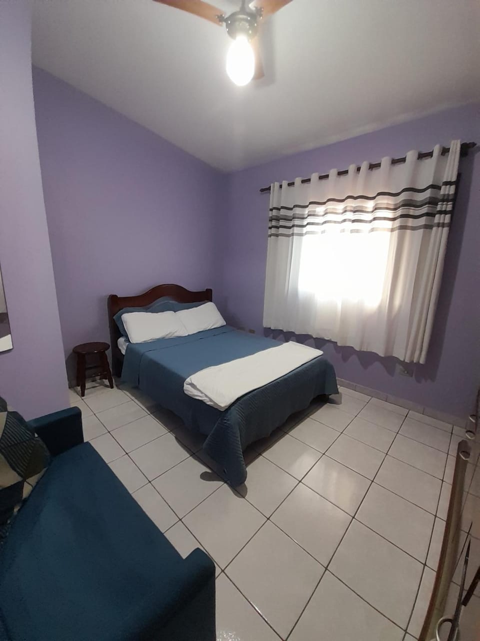 Suíte em casa compartilhada a poucos metros da praia Vacation rental in São Sebastião