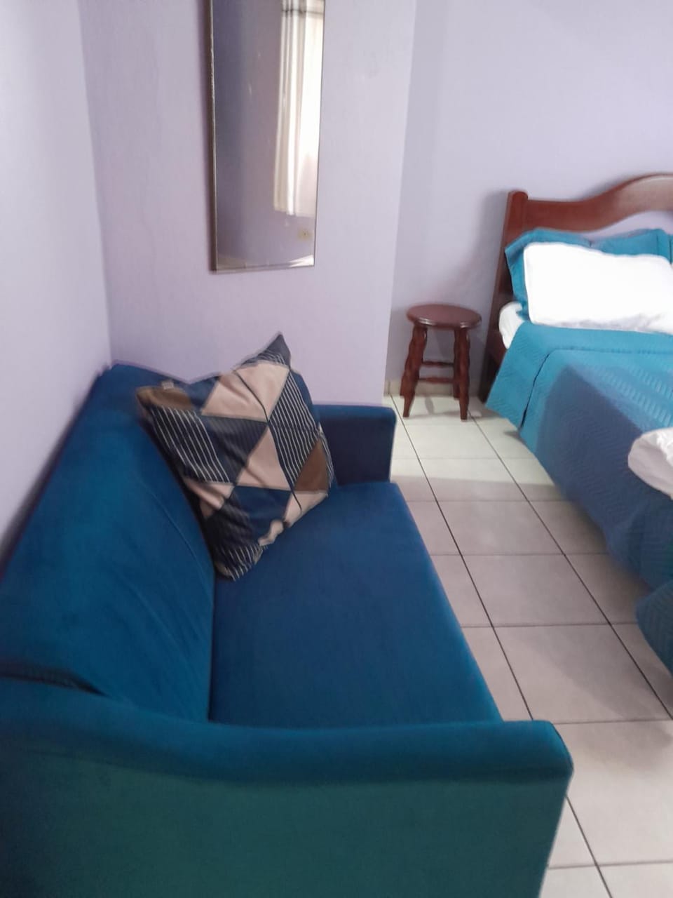 Suíte em casa compartilhada a poucos metros da praia Vacation rental in São Sebastião