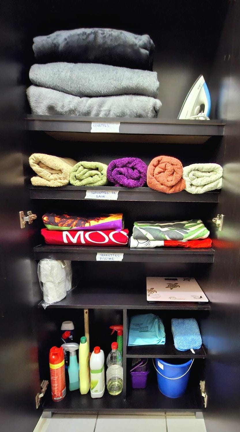 Bathroom, flat iron, towels, wardrobe