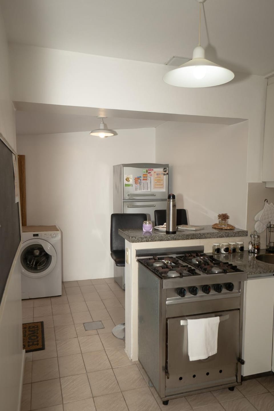 Kitchen or kitchenette, dishwasher, stove, washing machine