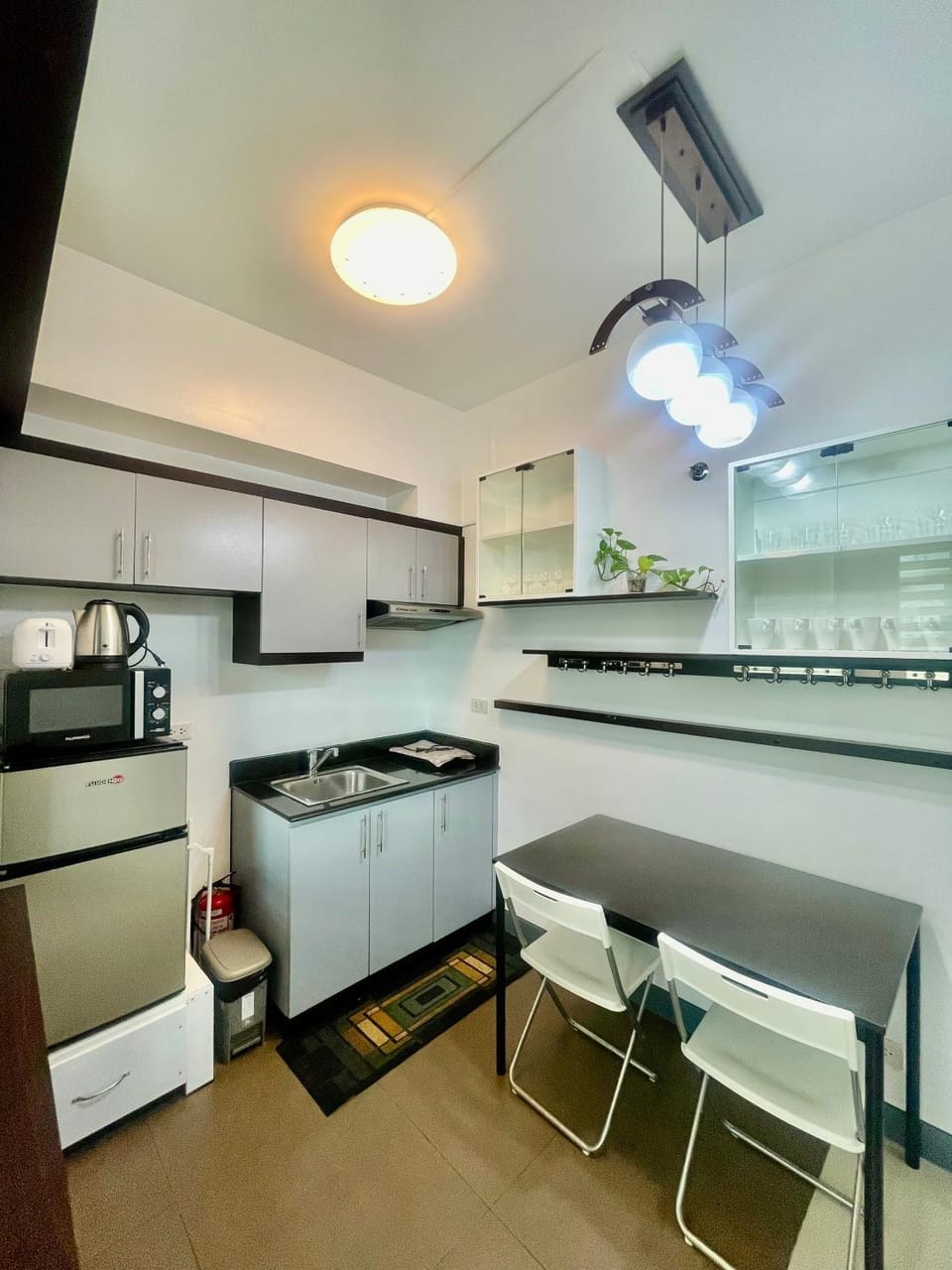 Kitchen or kitchenette, oven, stove, toaster