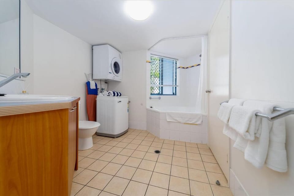 Shower, Toilet, Bathroom, towels, washing machine, dryer