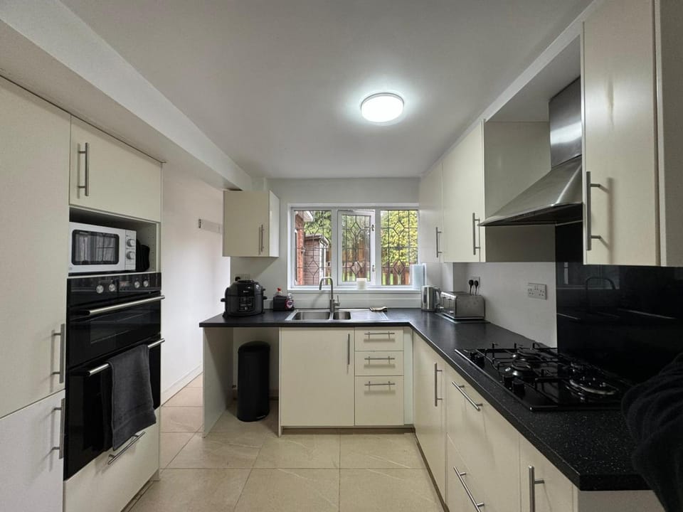 Kitchen or kitchenette, oven, stove