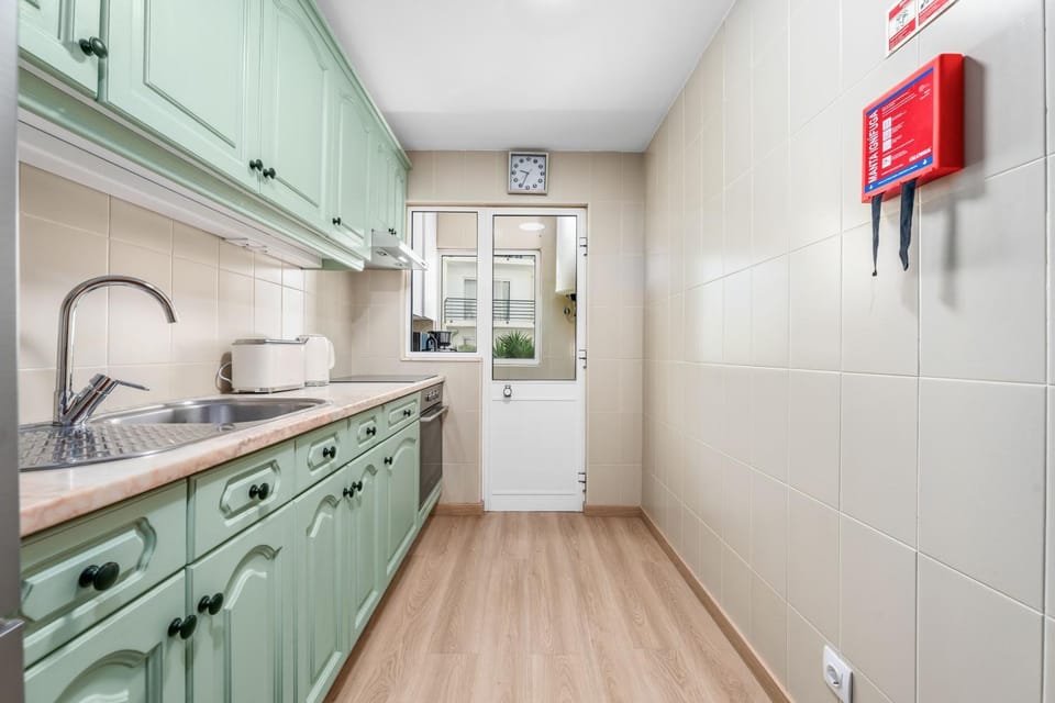 Kitchen or kitchenette, oven, stove