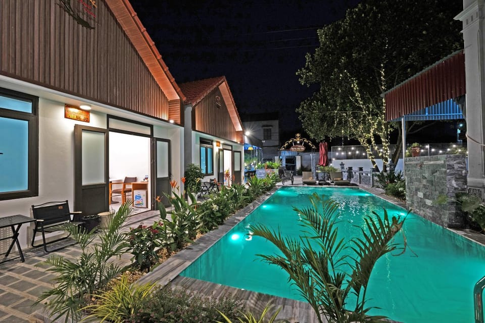 Property building, Night, Pool view, Swimming pool