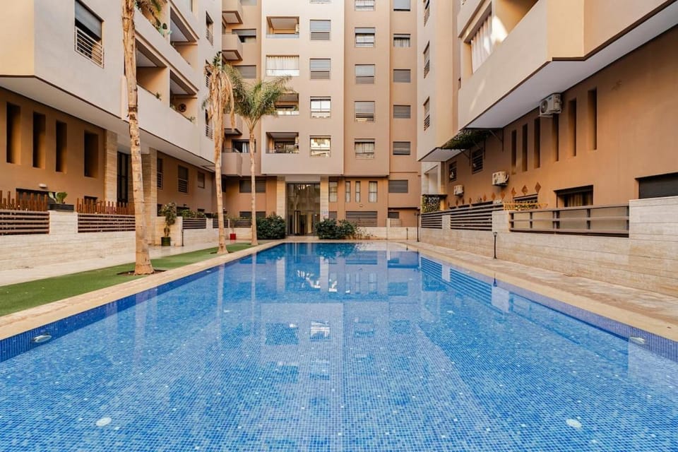 Premium Modern Central Flat Sun &Pool Wifi& PS4 Apartment in Marrakesh