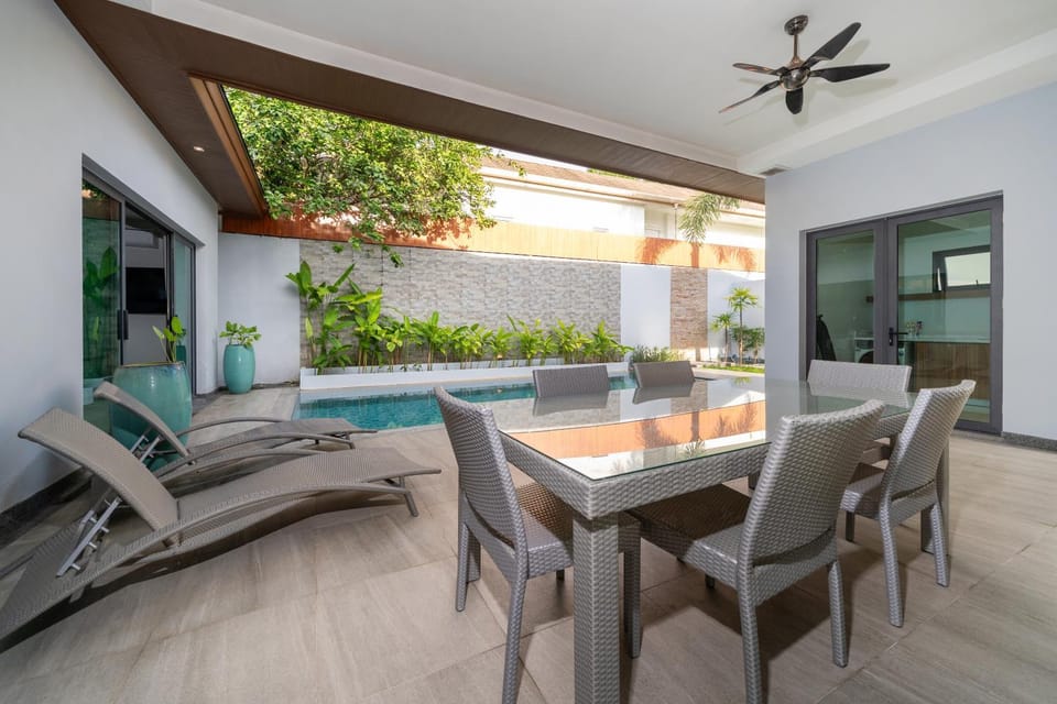 Patio, Seating area, Dining area, Pool view, Swimming pool, sunbed