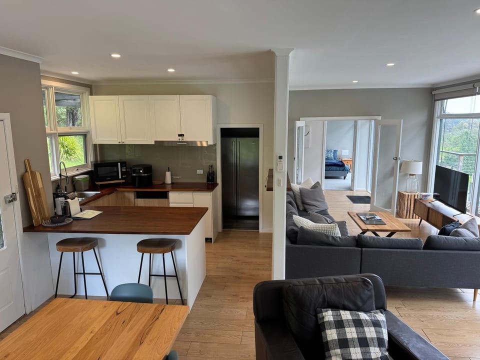 Living room, Dining area, fireplace, kitchen