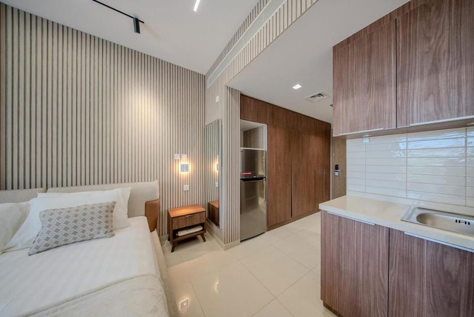 Poolview Studio Apartment in Zuhour Uptown AlZahia Apartment in Al Sharjah