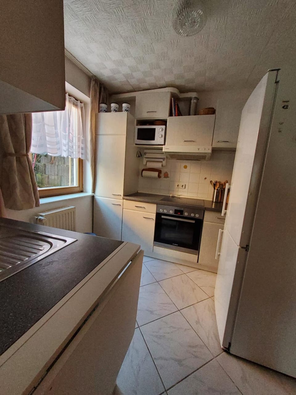Kitchen or kitchenette, oven, stove