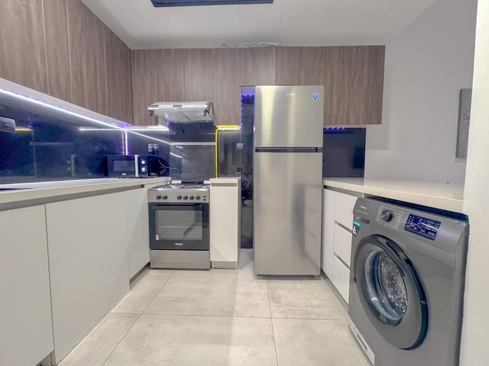 Kitchen or kitchenette, dishwasher, washing machine
