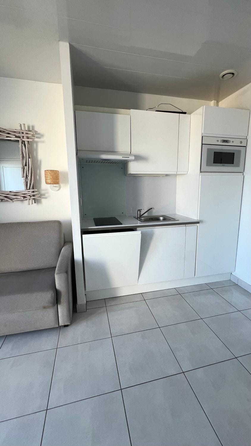 Kitchen or kitchenette, stove