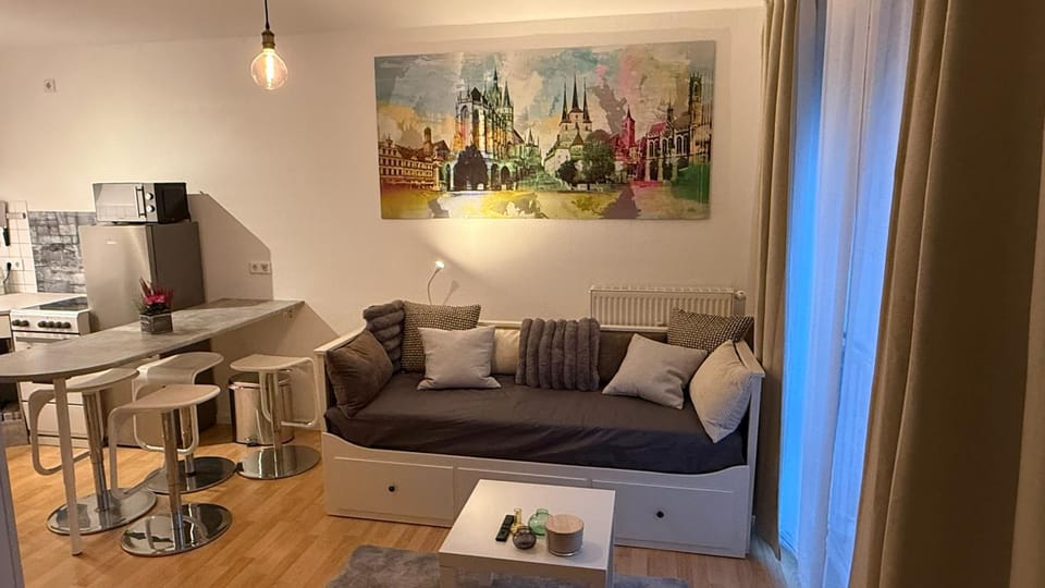 Kitchen or kitchenette, Living room, Seating area, Dining area