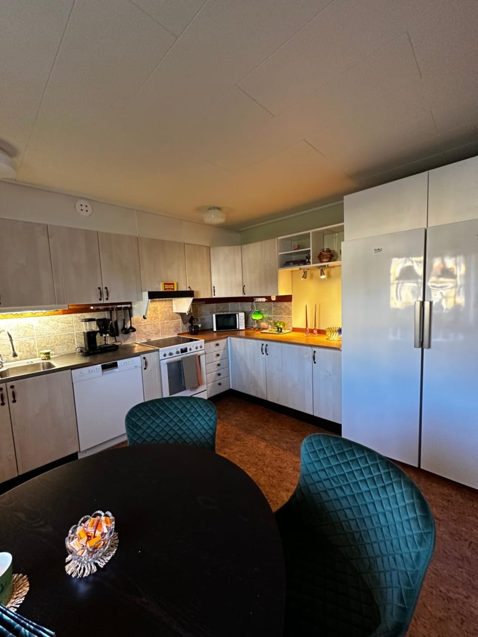 Kitchen or kitchenette, dishwasher, oven, stove