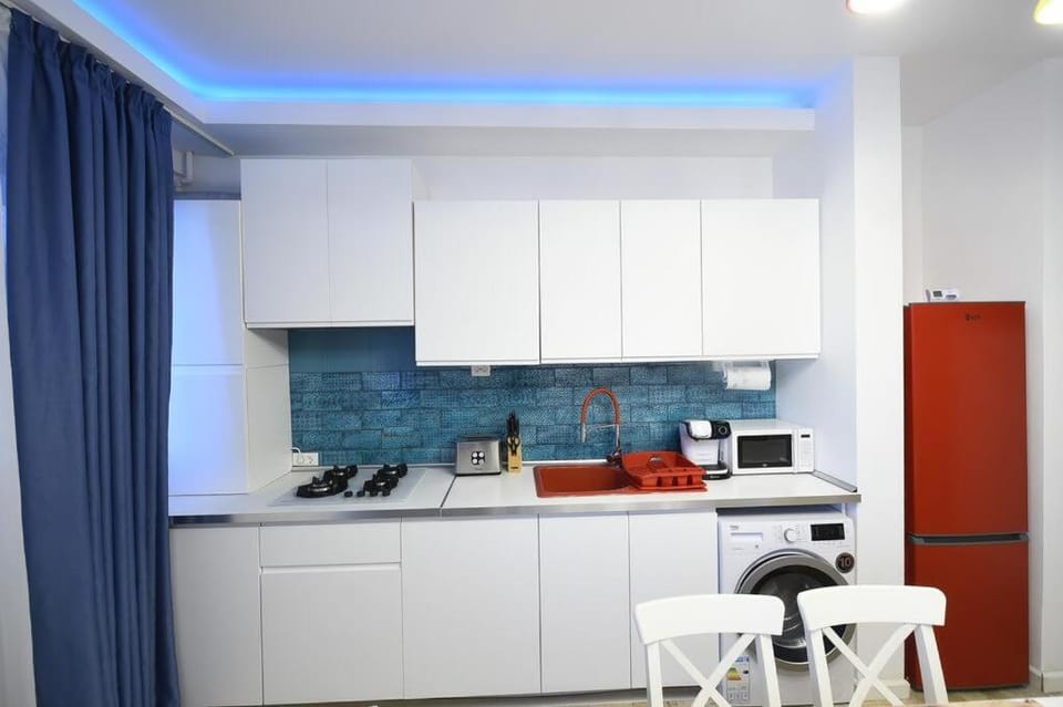 Kitchen or kitchenette, stove