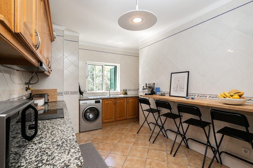 Kitchen or kitchenette, Dining area, stove, washing machine