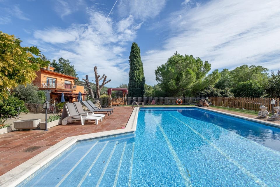 Property building, Living room, Swimming pool