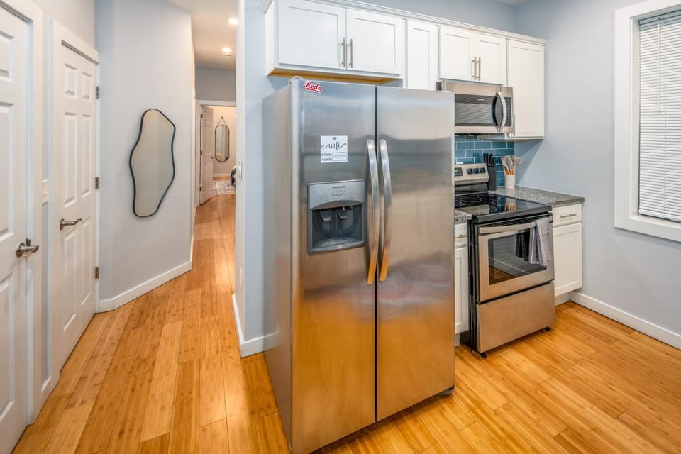 Kitchen or kitchenette, dishwasher, oven, stove