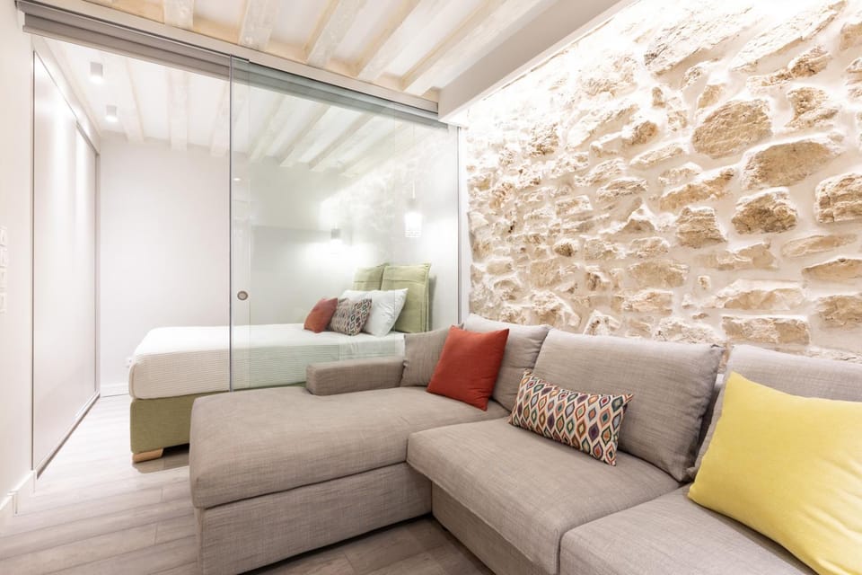 Bed, Living room, Seating area, Bedroom