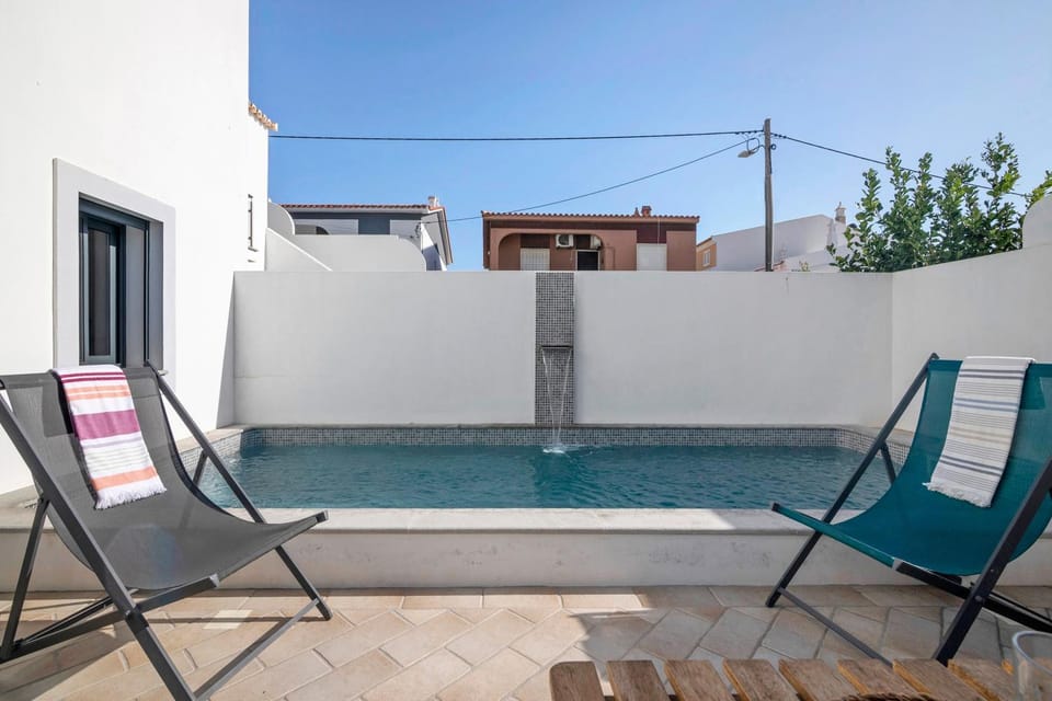 Property building, Living room, Swimming pool