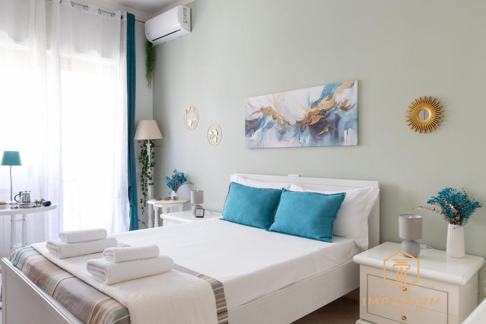Bed, Photo of the whole room, Bedroom, towels, air conditioner