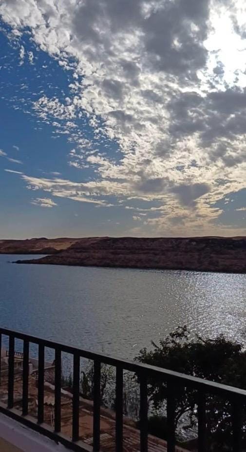 Natural landscape, Seating area, Lake view, Sunset