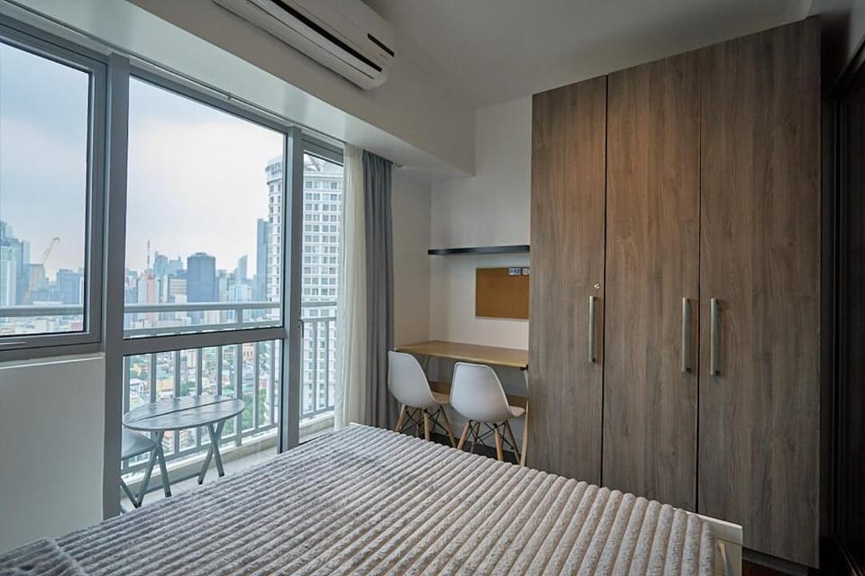 Cozy Crib at Acqua Residences - Rockwell Views Apartment in Mandaluyong