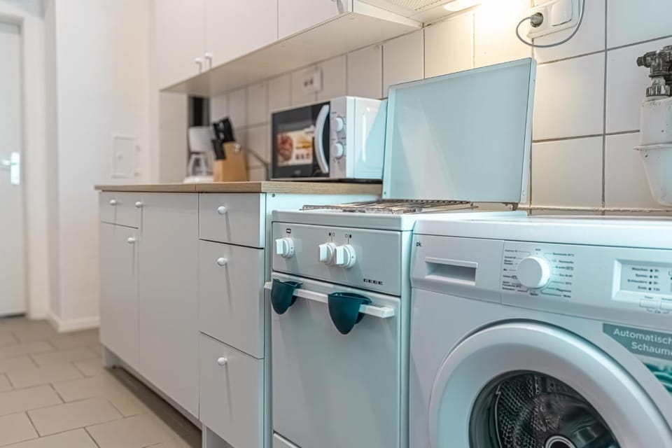 Kitchen or kitchenette, washing machine