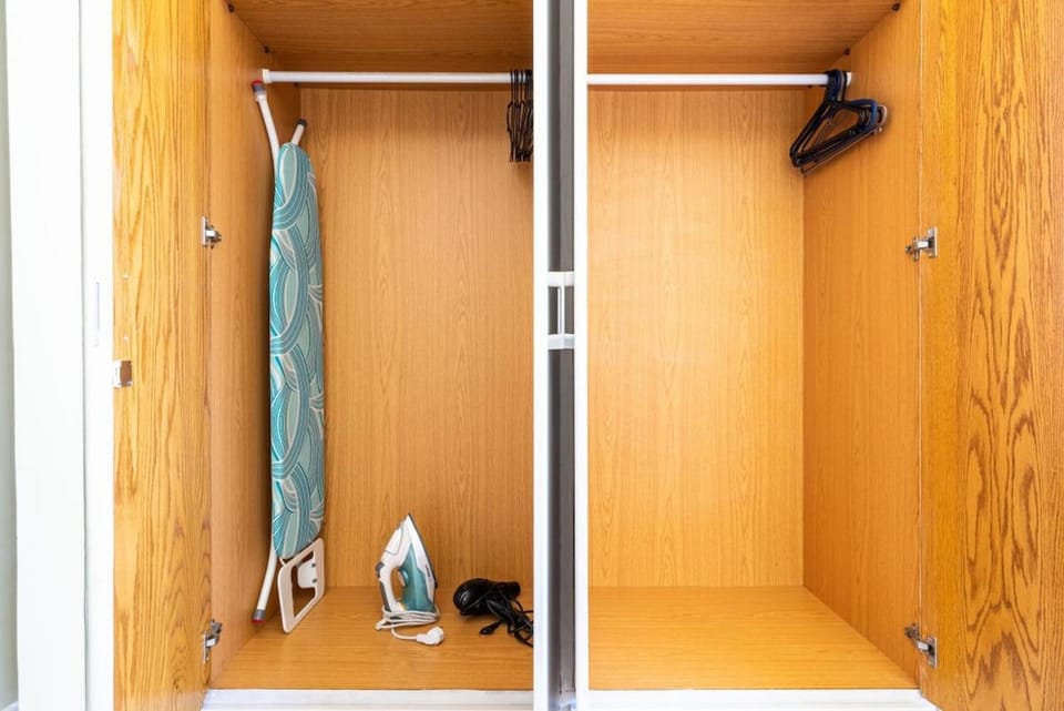 Bedroom, flat iron, hair dryier, wardrobe