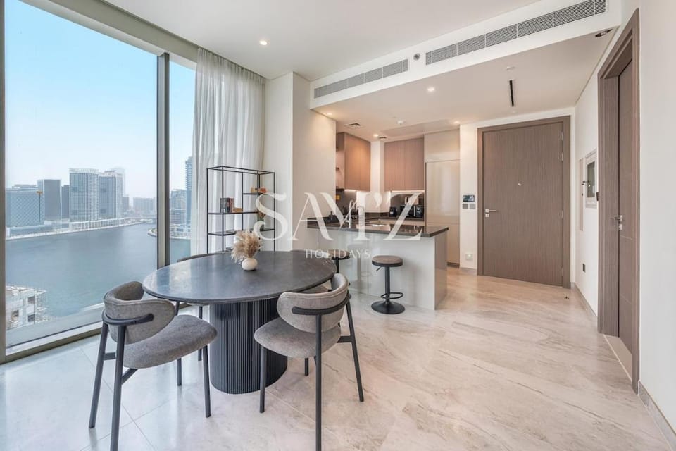 Sleek 1BR Gem - Unit 1709 - Peninsula Five Apartment in Dubai