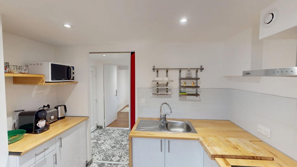 Kitchen or kitchenette, stove, toaster