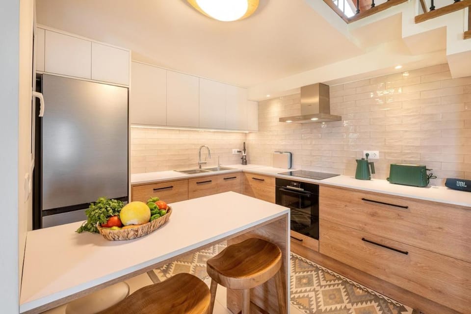 Kitchen or kitchenette, oven, stove, toaster