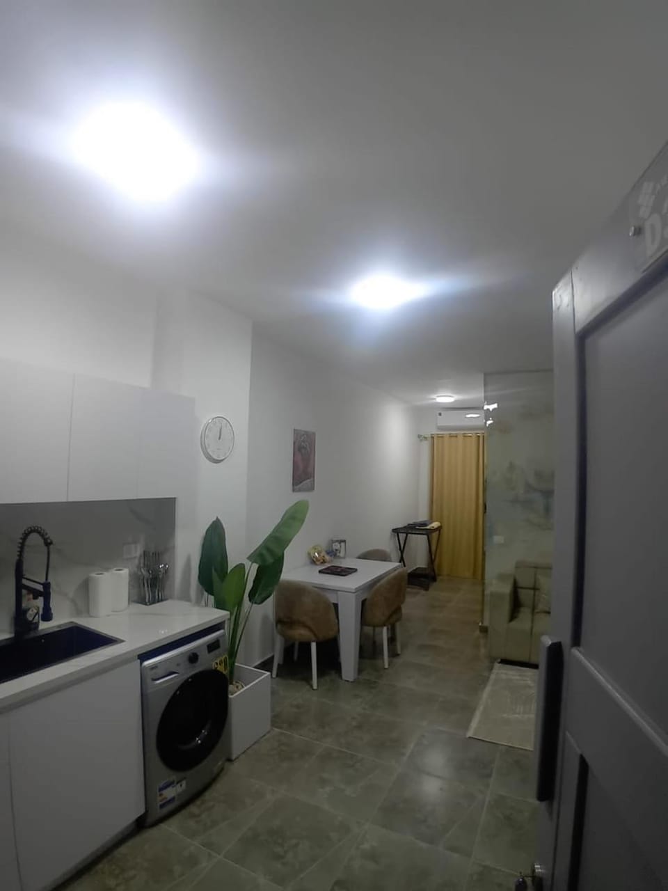 Kitchen or kitchenette, Dining area, stove, washing machine