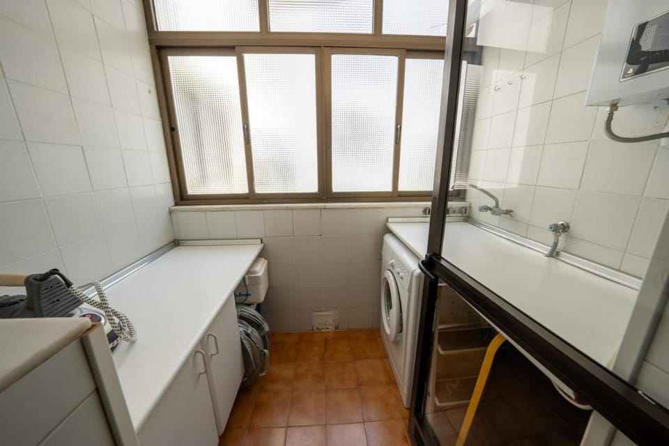 Kitchen or kitchenette, washing machine