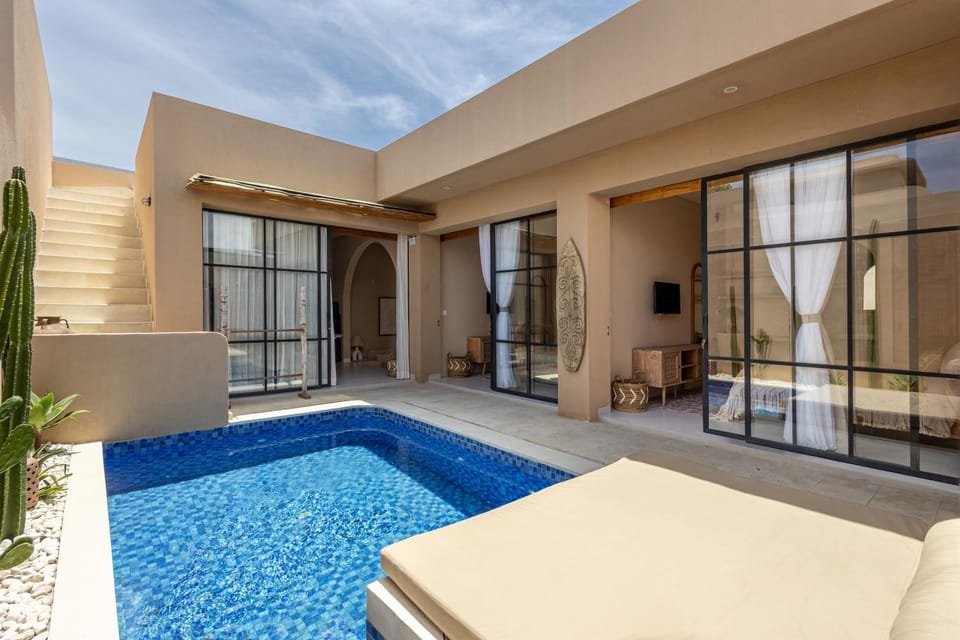 Patio, Day, Natural landscape, Pool view, Swimming pool, sunbed
