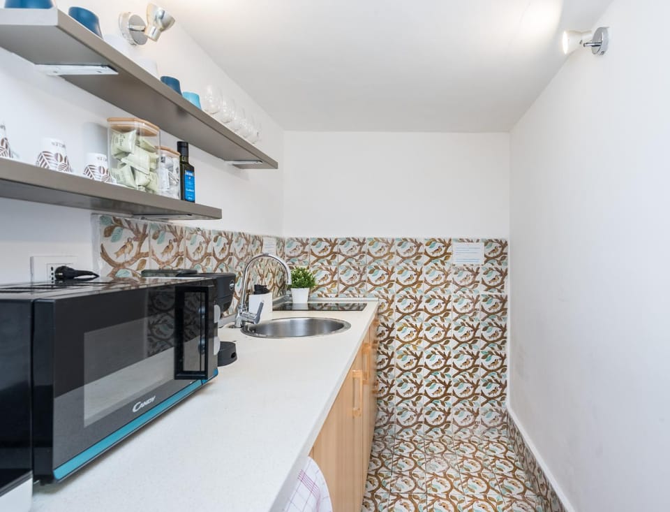 Kitchen or kitchenette, stove