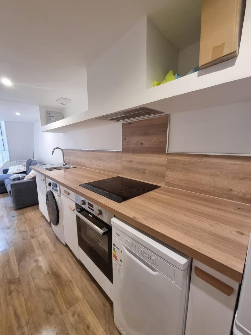 Kitchen or kitchenette, dishwasher, oven, stove, washing machine, dryer