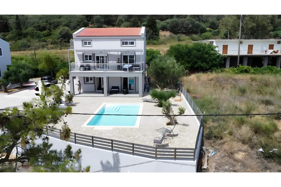 Property building, Living room, Swimming pool