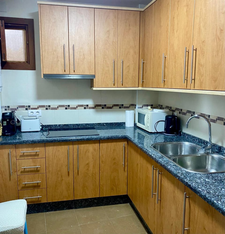 Kitchen or kitchenette, toaster