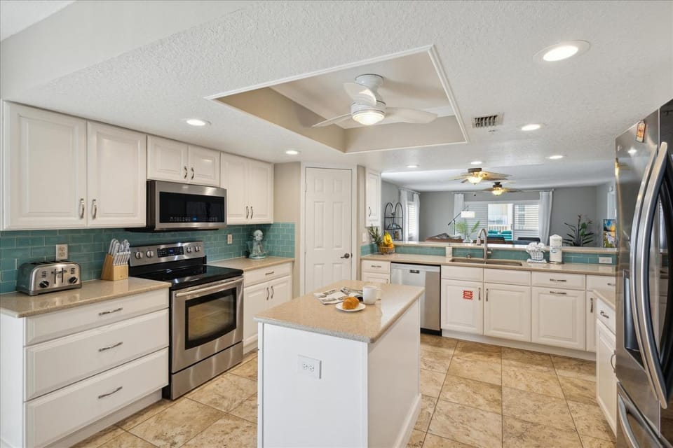 Kitchen or kitchenette, dishwasher, microwave, oven, toaster