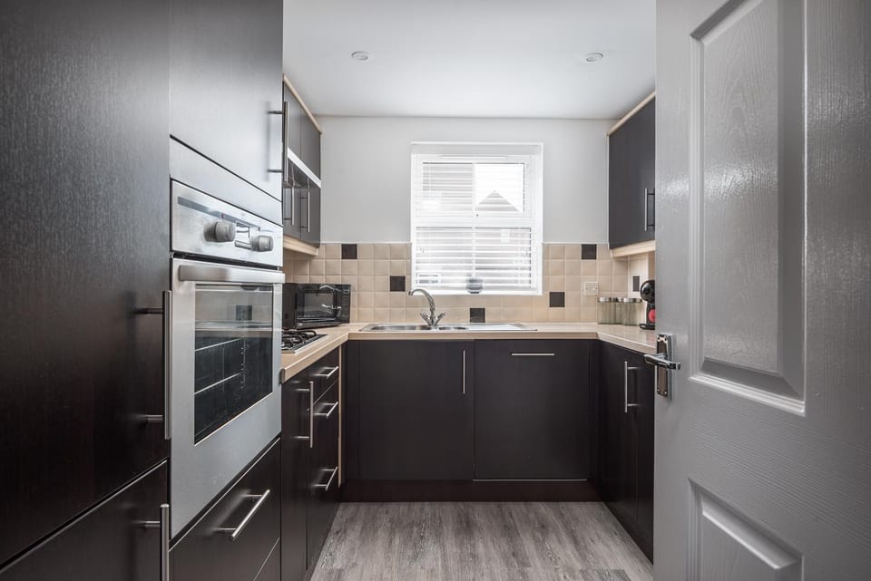Kitchen or kitchenette, oven, stove