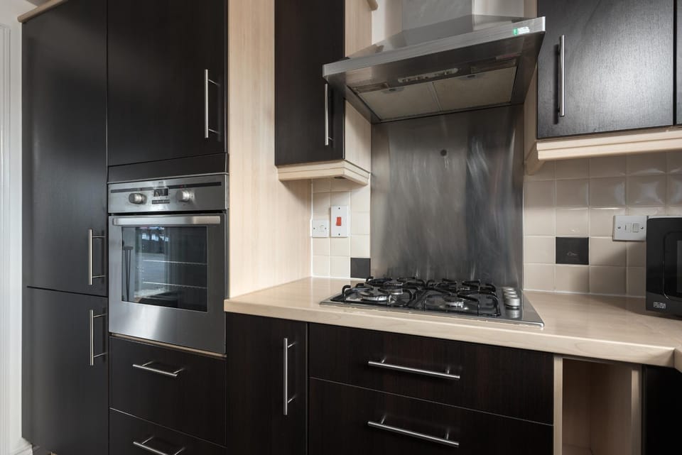 Kitchen or kitchenette, oven, stove, toaster
