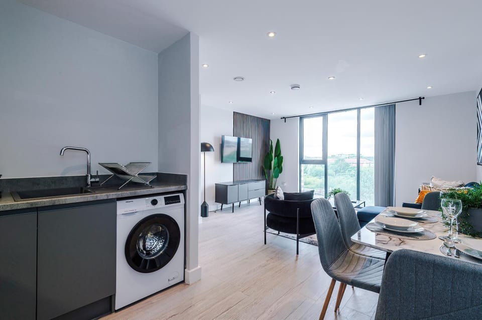 Kitchen or kitchenette, Living room, Seating area, Dining area, stove, washing machine