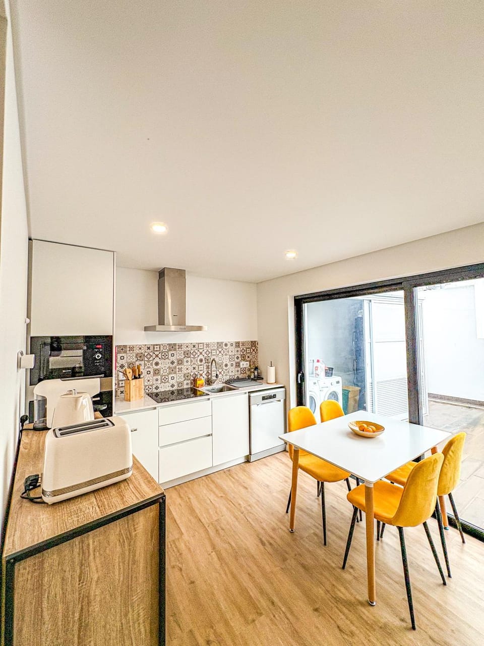 Kitchen or kitchenette, dishwasher, microwave, oven, stove, toaster, dryer